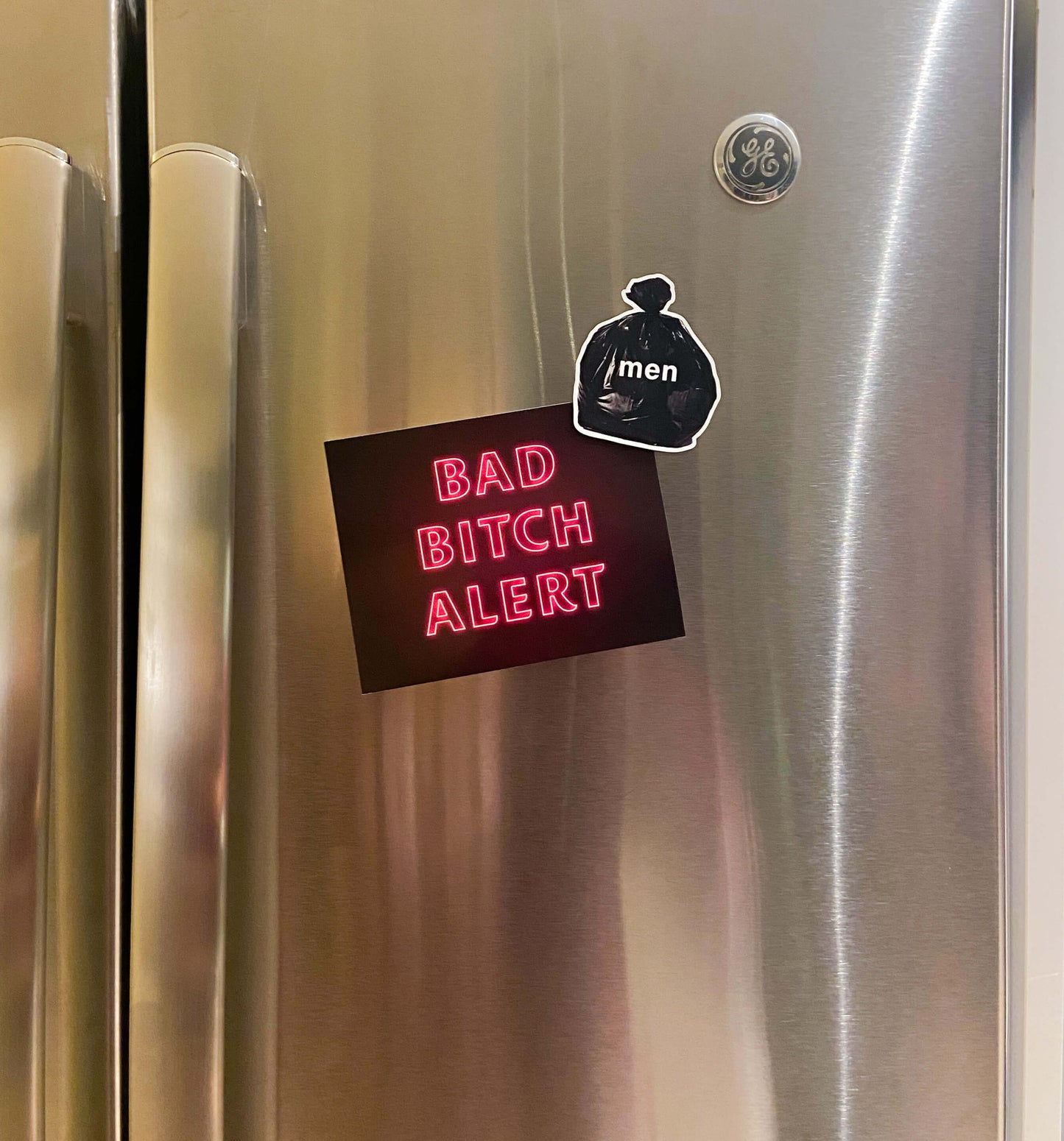 garbage bag magnets labeled "men"