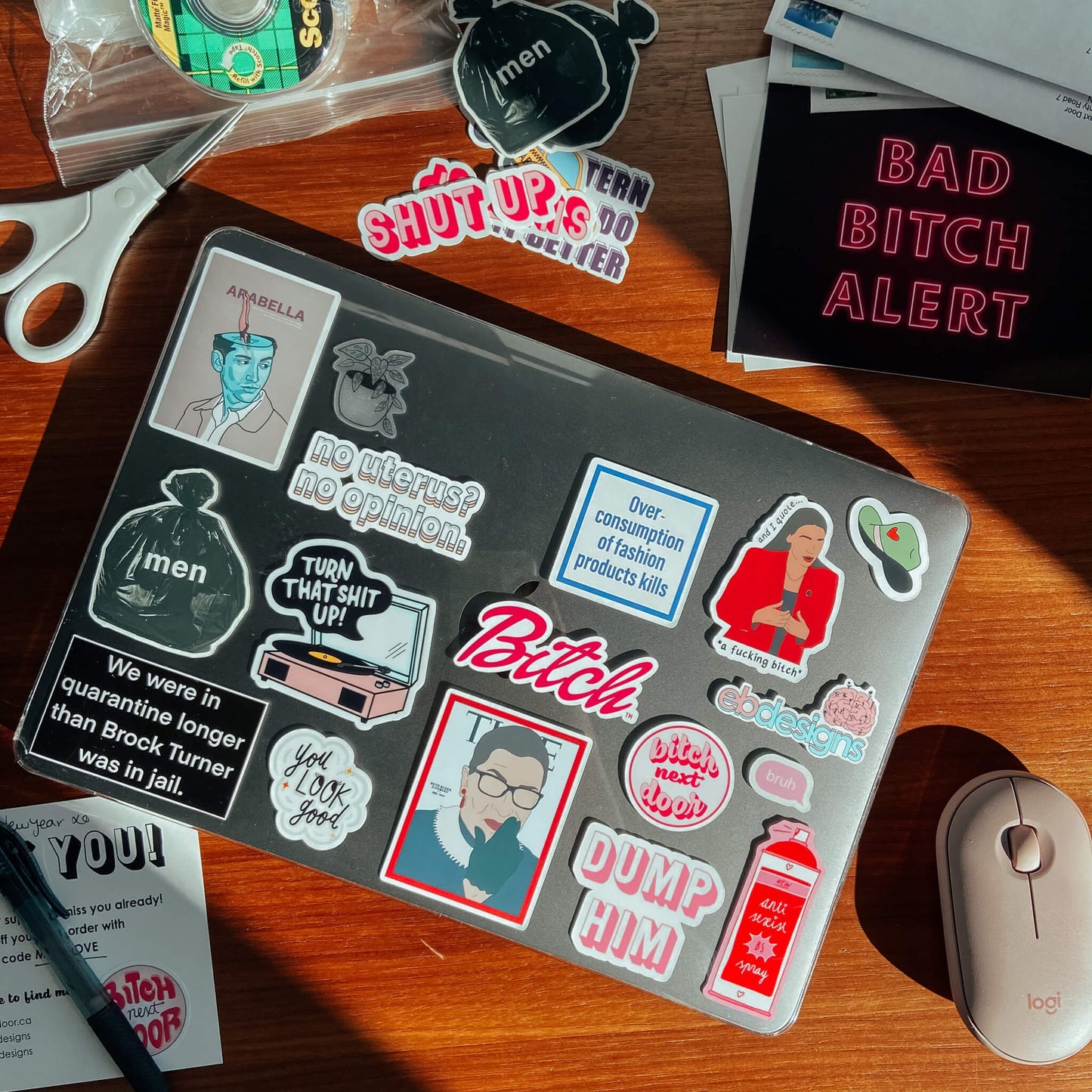 Series of BND stickers on a laptop